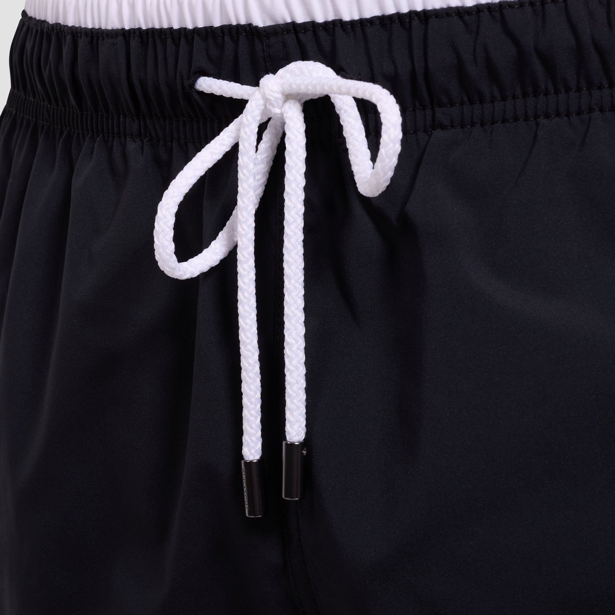 Quinn Mid-Length Solid Swim Trunks
