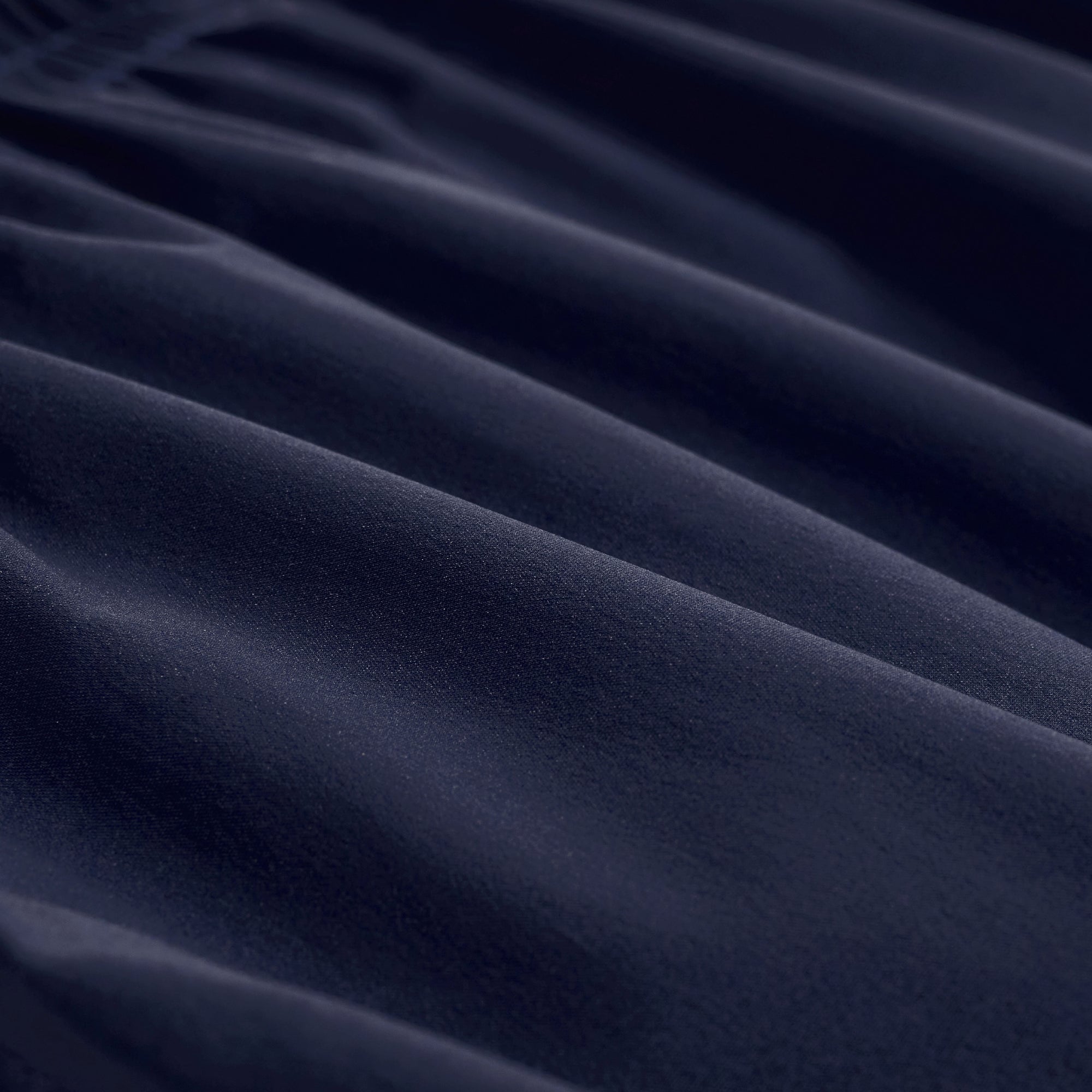 Quinn Mid-Length Solid Swim Trunks
