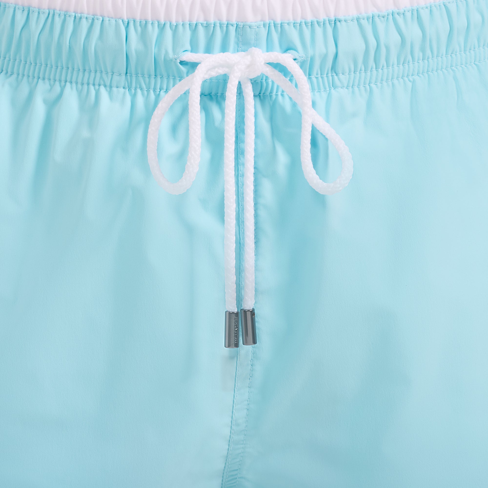 Quinn Mid-Length Solid Swim Trunks