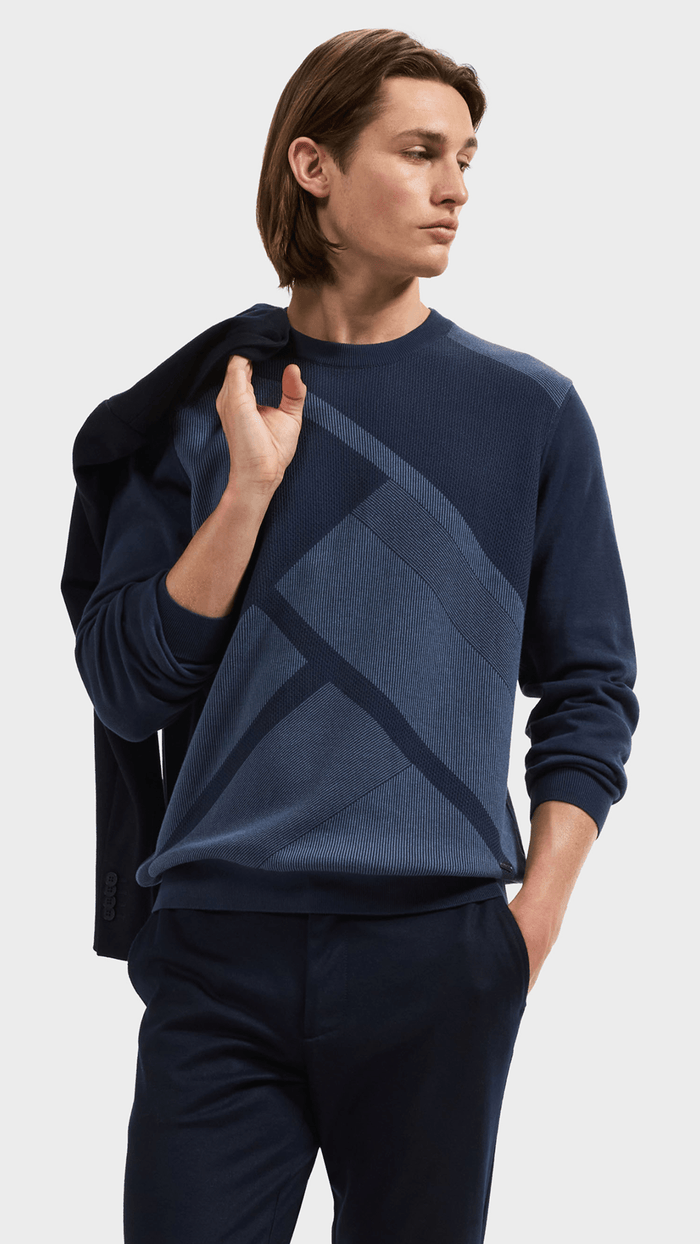 SWEATERS