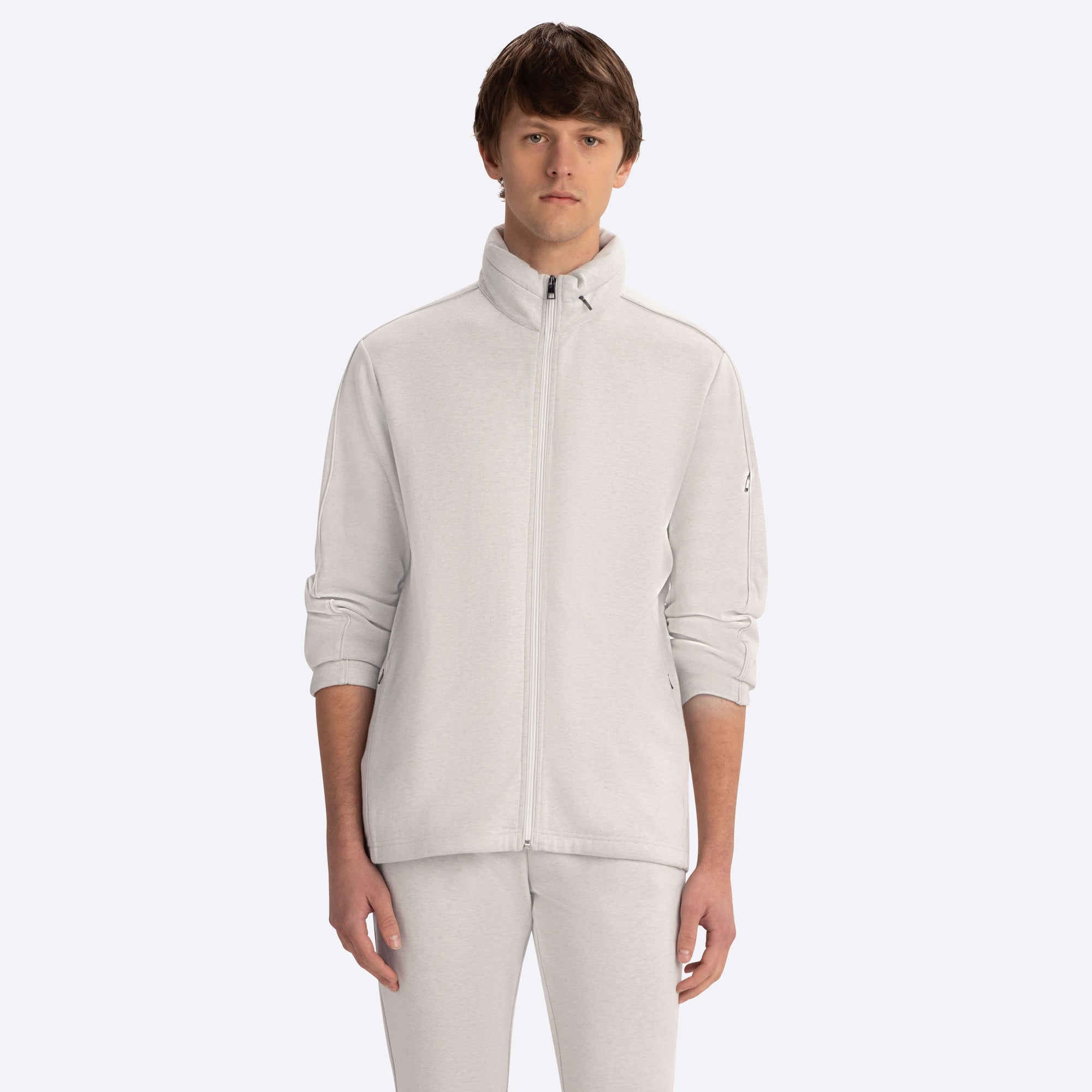 Full Zip Mock Neck Sweatshirt with Stow-Away Hood.