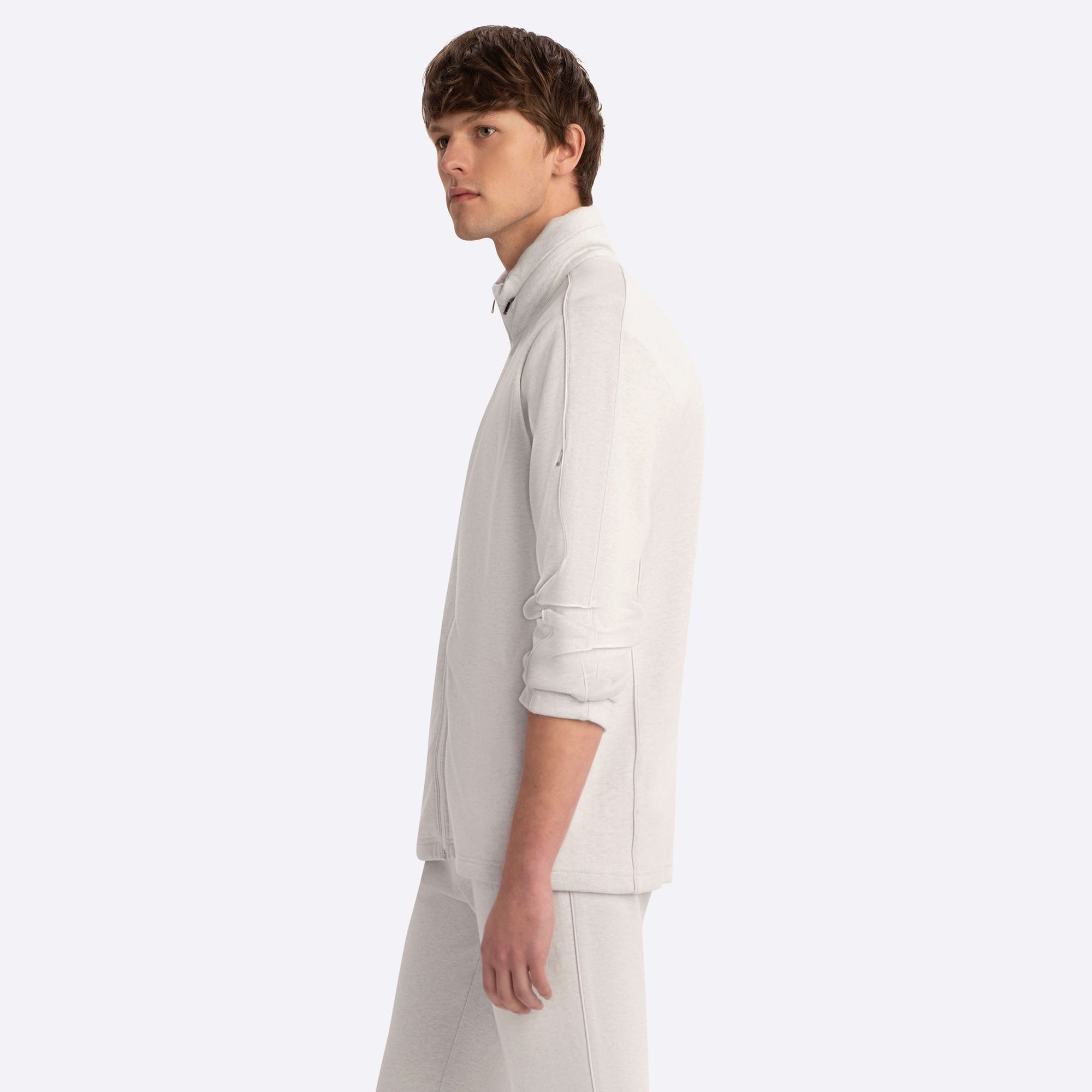 Full Zip Mock Neck Sweatshirt with Stow-Away Hood.