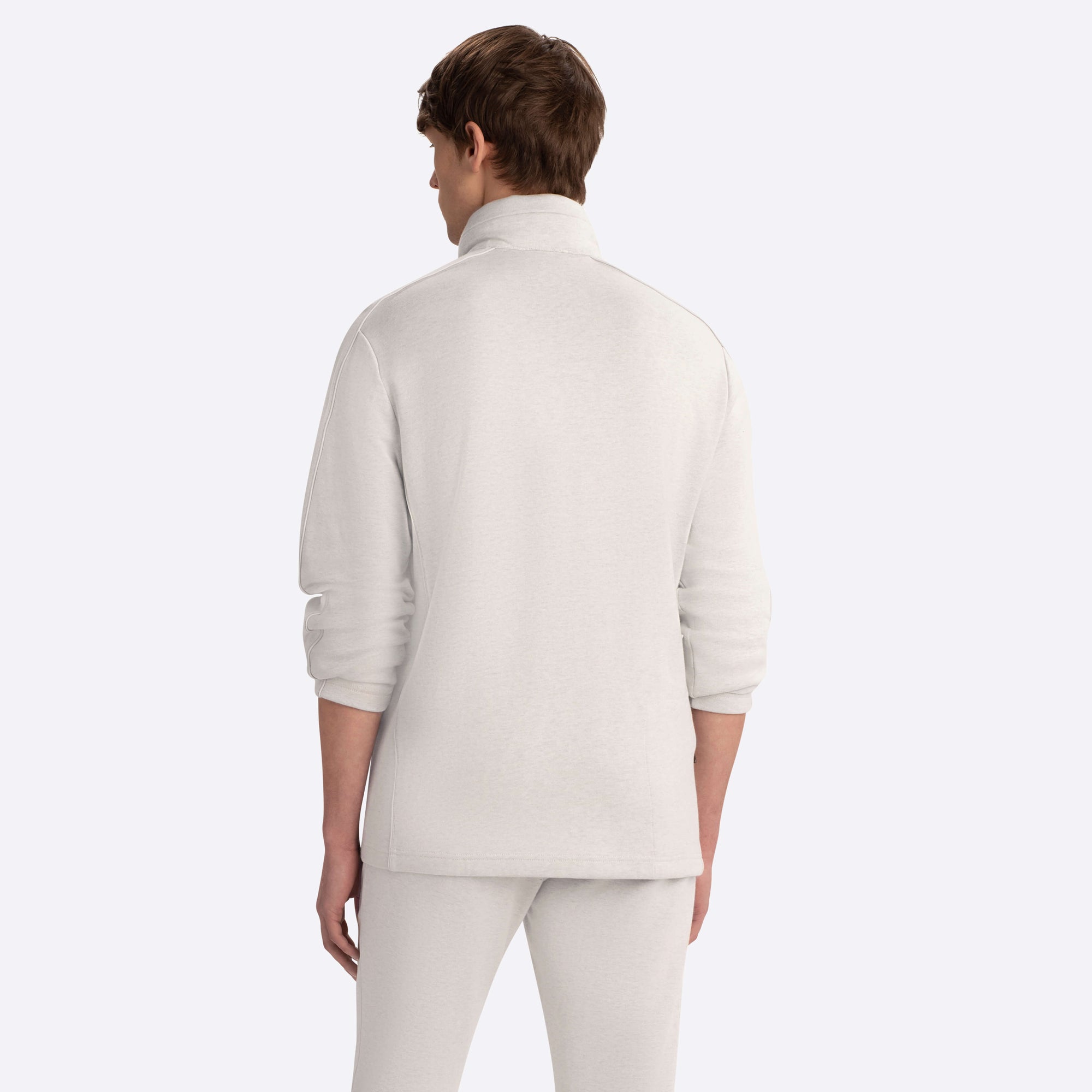 Full Zip Mock Neck Sweatshirt with Stow-Away Hood.