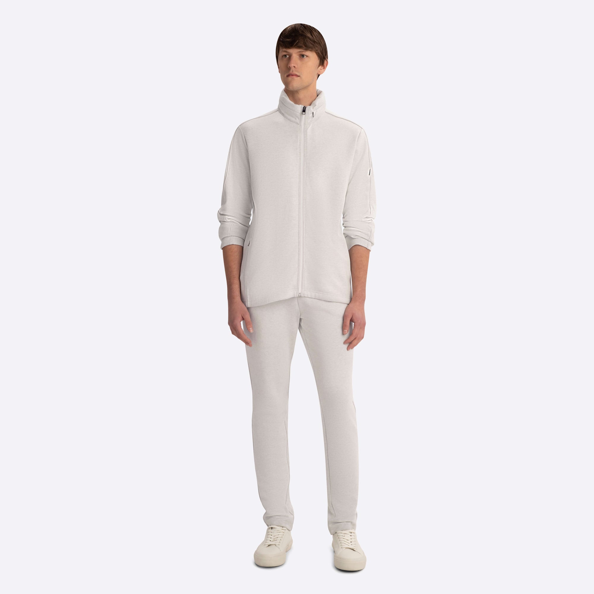 Full Zip Mock Neck Sweatshirt with Stow-Away Hood.