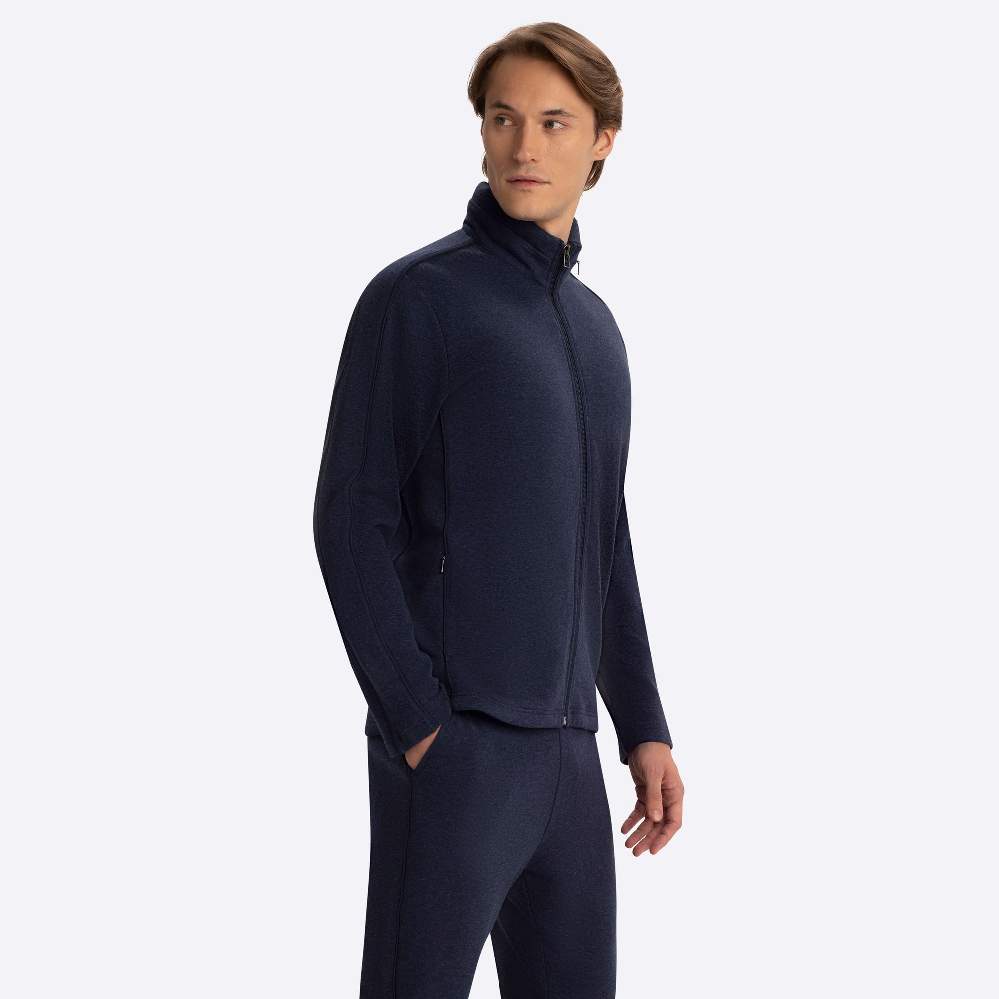 Full Zip Mock Neck Sweatshirt with Stow-Away Hood.