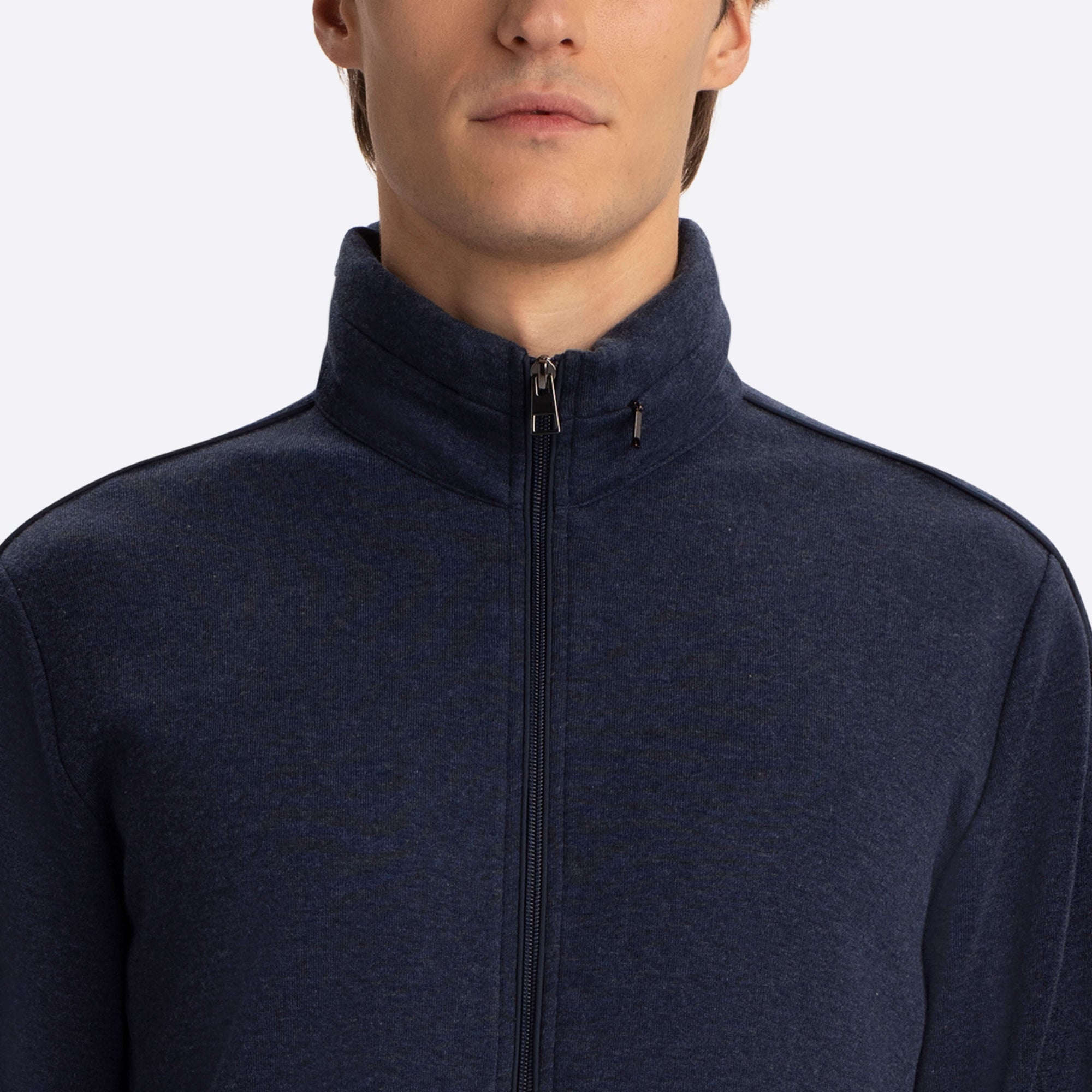 Full Zip Mock Neck Sweatshirt with Stow-Away Hood.